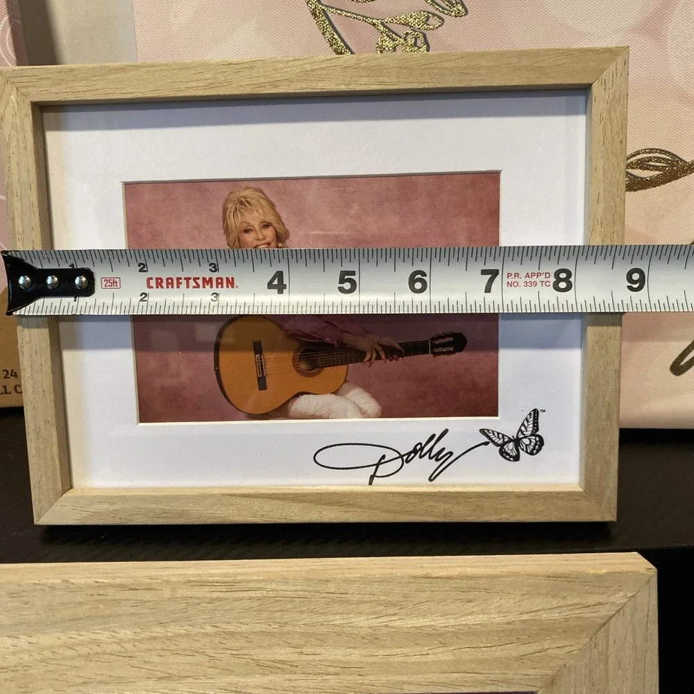 New 2  Dolly Parton framed pictures